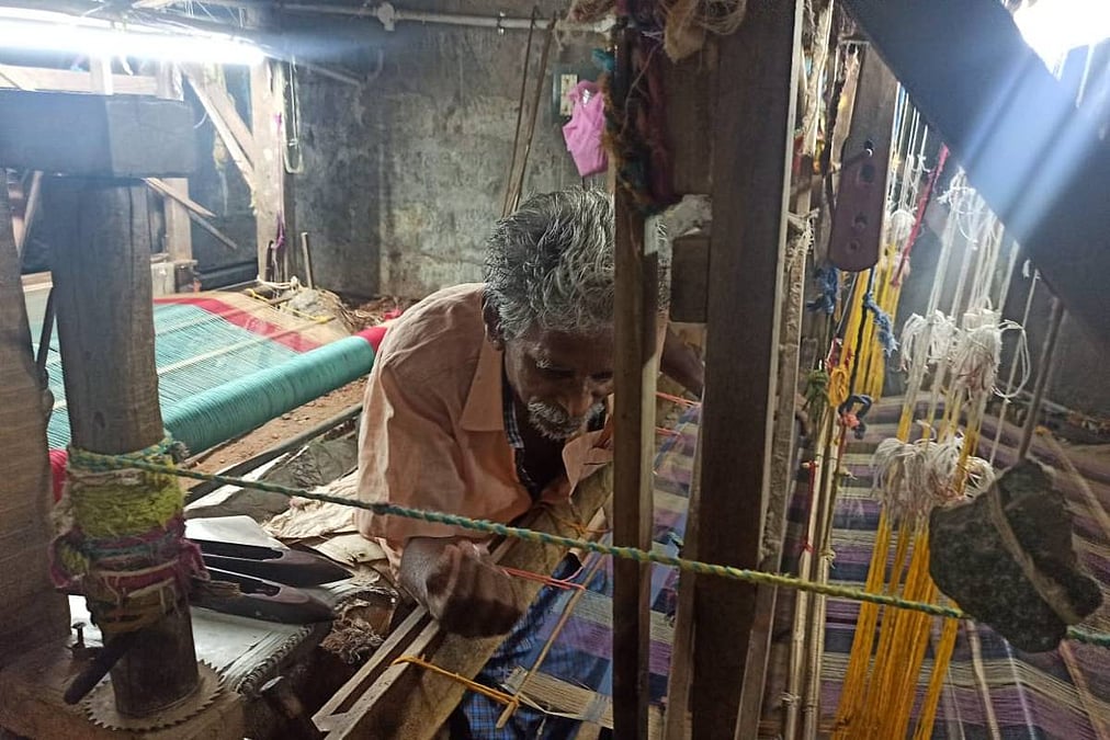 A Mangalagiri weaver working at the loom